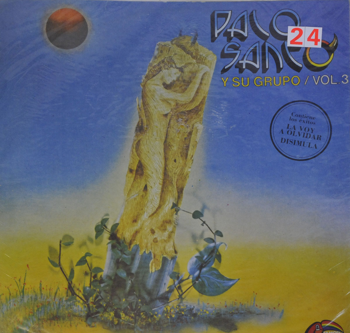 Surreal artwork of a woman carved into a vertical log under a dark sun, album cover of Palo Santo y Su Grupo Vol. 3 with blue to yellow gradient background and round sticker mentioning La Voy A Olvidar and Disimula.
